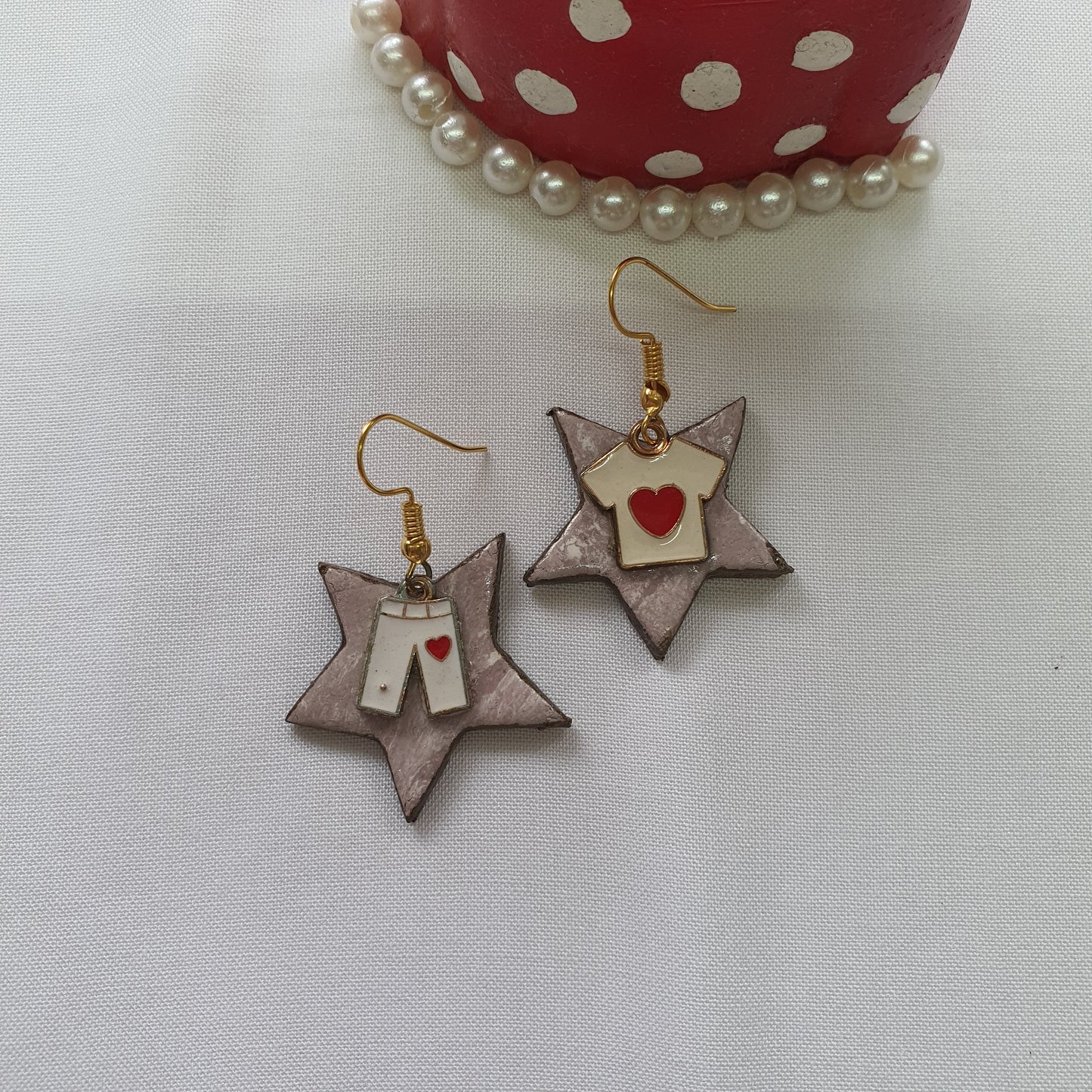Star shaped shirt-pants earrings