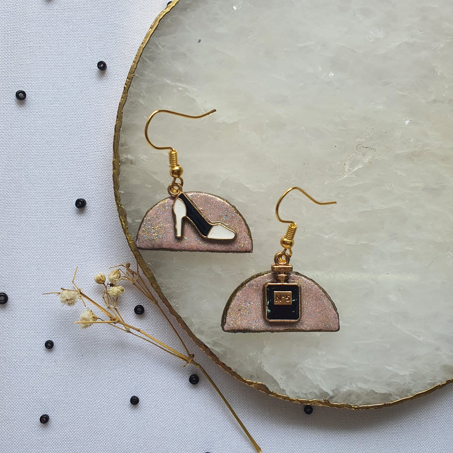 Asymmetric shoe-perfume earrings
