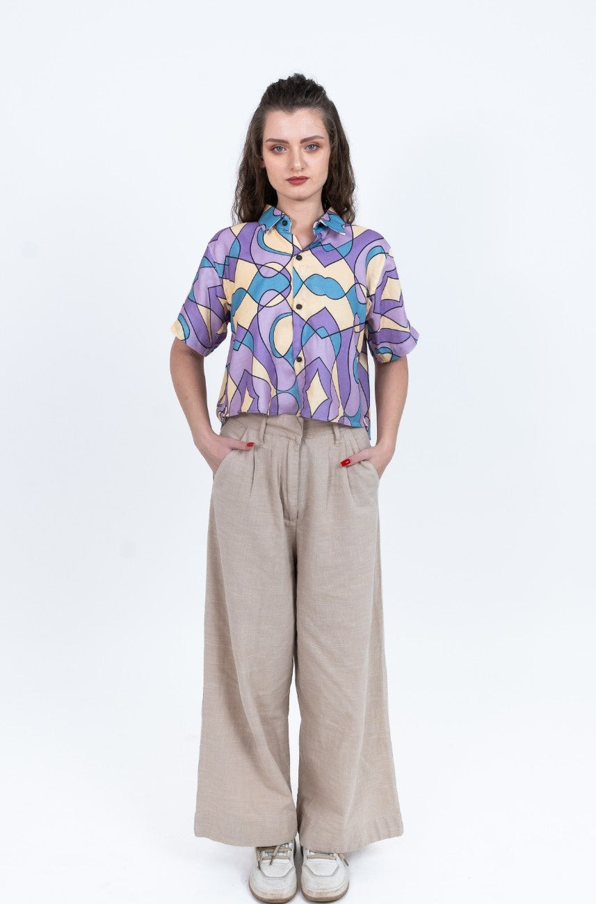 Cropped women's shirt in pastel purple blue and yellow abstract print with short sleeves