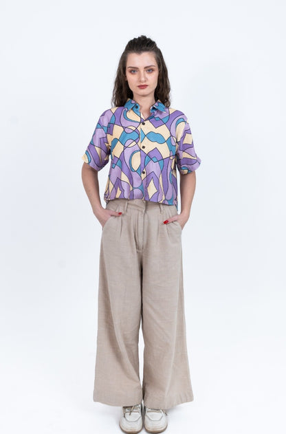 Cropped women's shirt in pastel purple blue and yellow abstract print with short sleeves