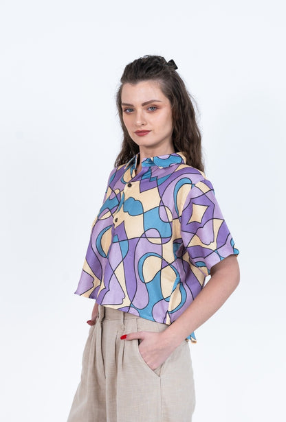 Cropped women's shirt in pastel purple blue and yellow abstract print with short sleeves
