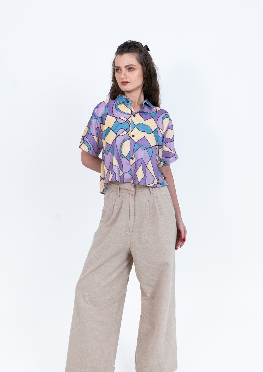 Cropped women's shirt in pastel purple blue and yellow abstract print with short sleeves