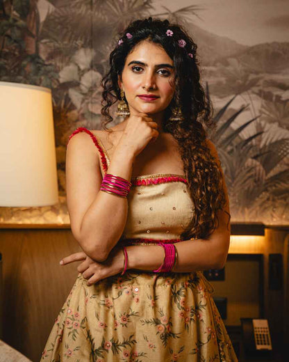 Dull gold with pink floral Lehenga
