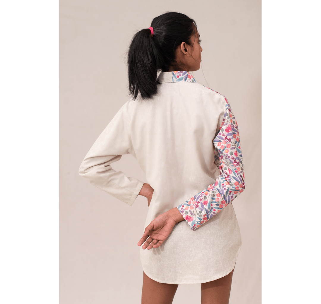 Off white textured half and half asymmetrical pink floral shirt dress