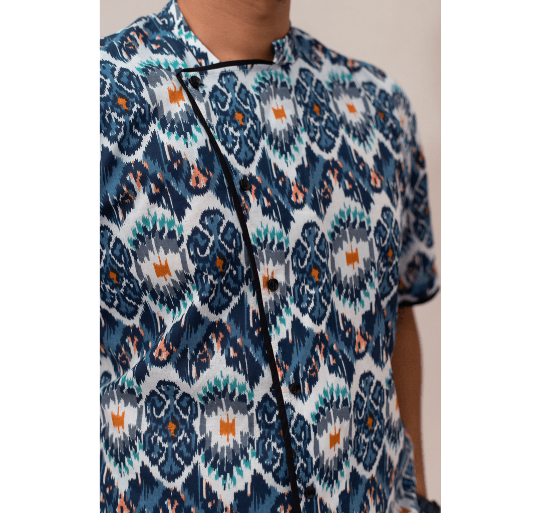 Blue all over mixed print Chinese collar short sleeved shirt with black piping